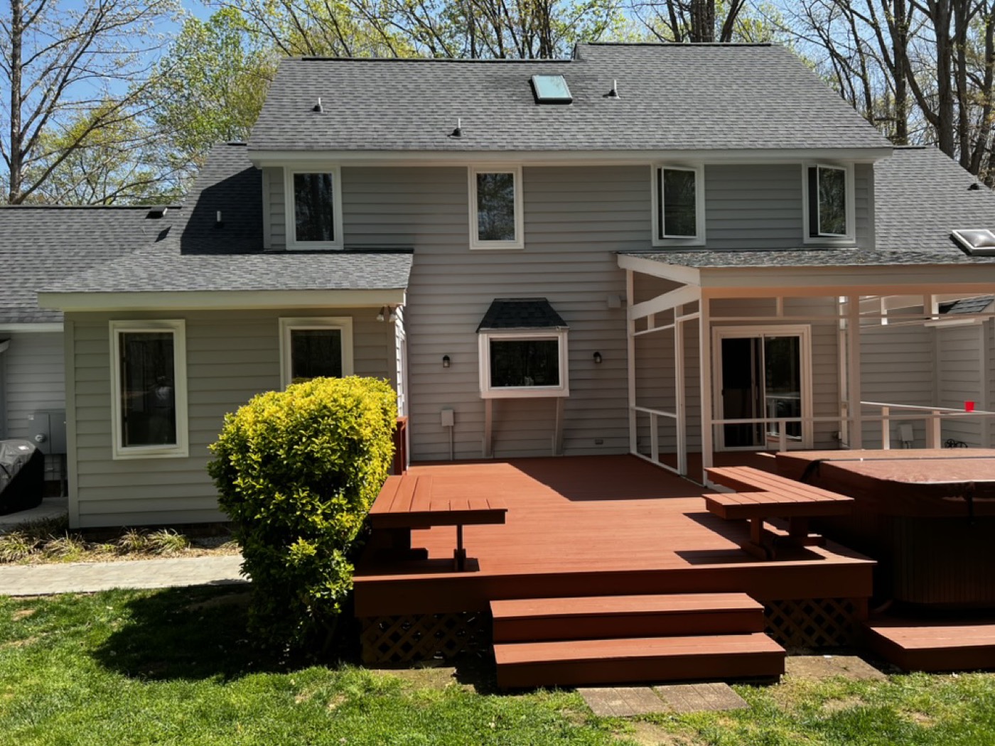 Restored and re-stained deck with hot tub