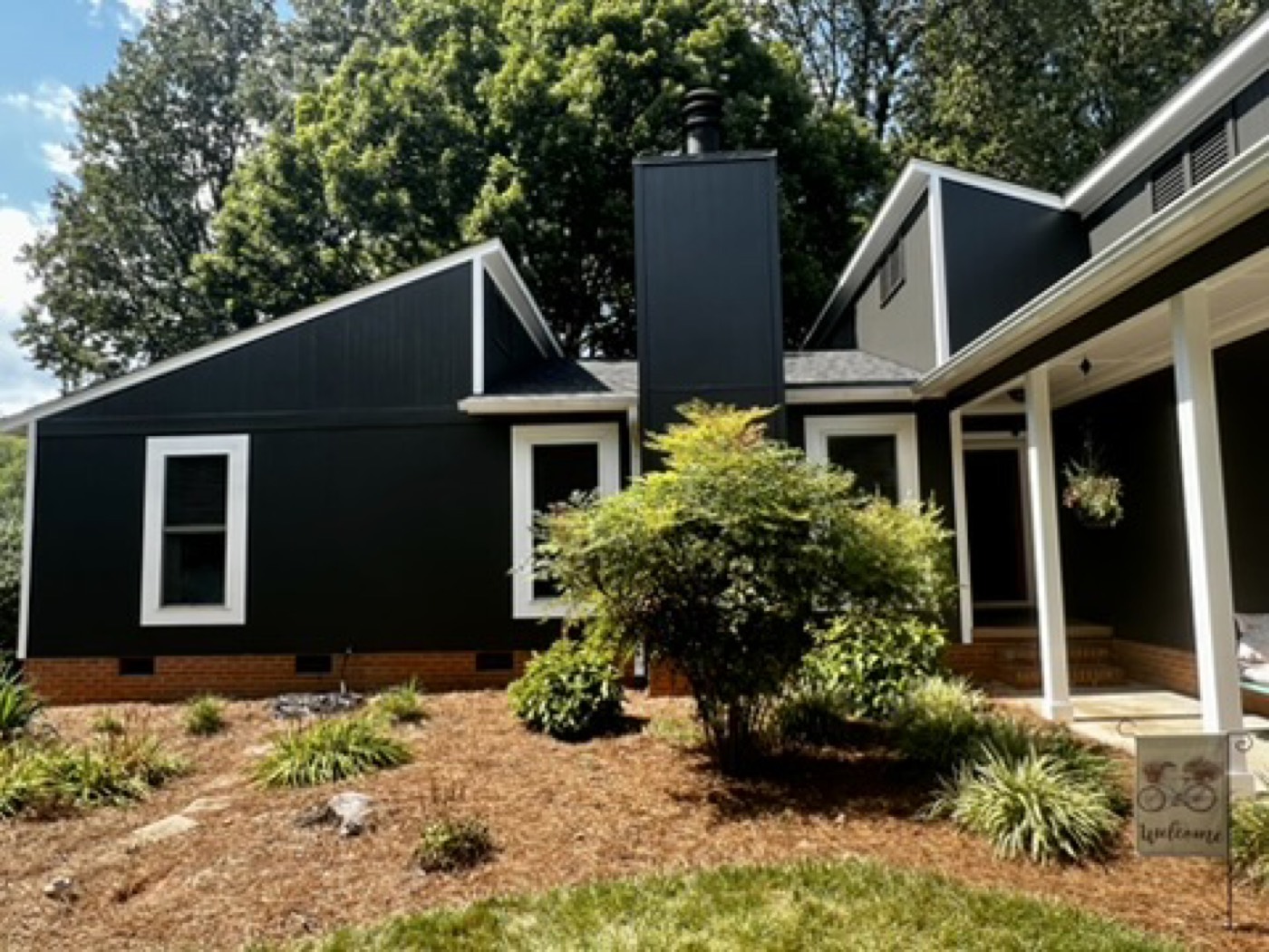 Full exterior repaint, black with white trim
