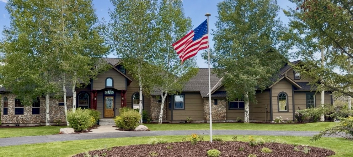 Repainted stone and siding home in Driggs, Idaho